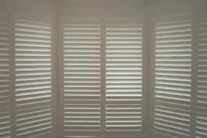 Composite plantation shutters block cold drafts